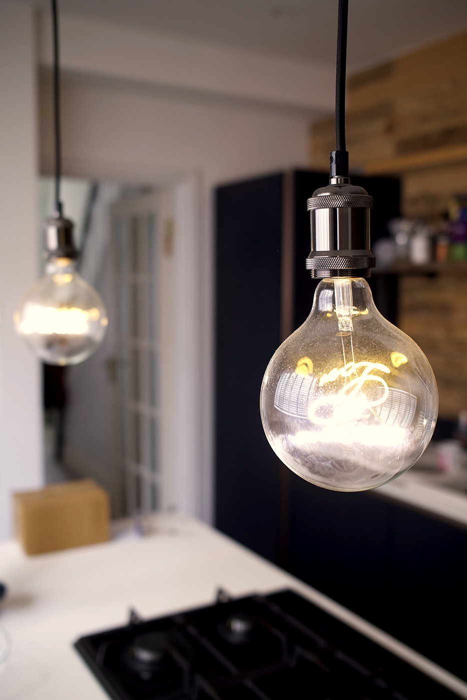 Kitchen pendant lighting installation over island, Cardiff — electrical work by Livvingale