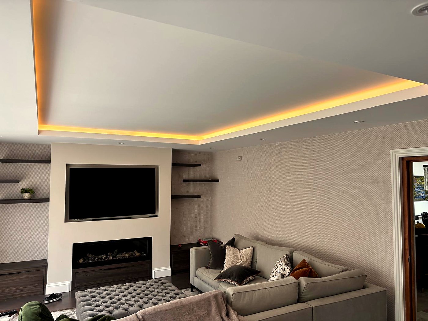 LED cove and ambient ceiling lighting installation in a living room, South Wales — by Livvingale
